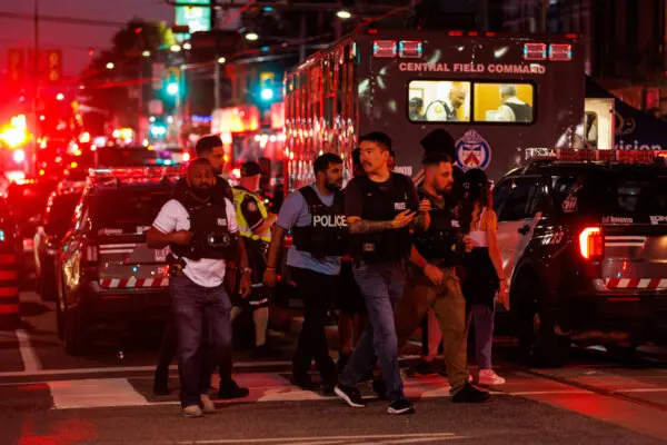 Police respond to an active shooter at the Salsa on St. Clair event in Toronto, on July 11, 2026. (The Canadian Press/Keito Newman)