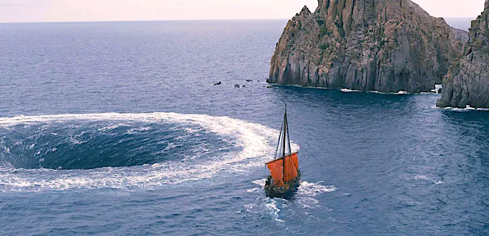 Odysseus steers his ship precariously close to Charybdis, the ship-swallowing vortex-monster, in "The Odyssey." (Universal Pictures)