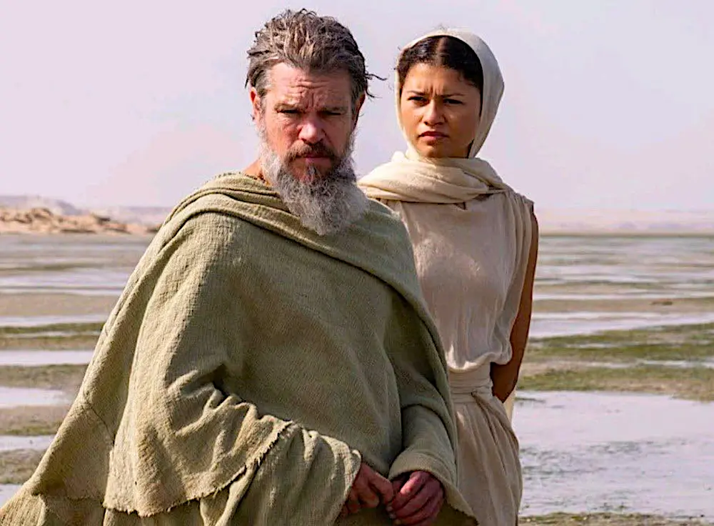Odysseus (Matt Damon), remembering who he is, with the help of goddess Pallas Athena (Zendaya), in "The Odyssey." (Universal Pictures)