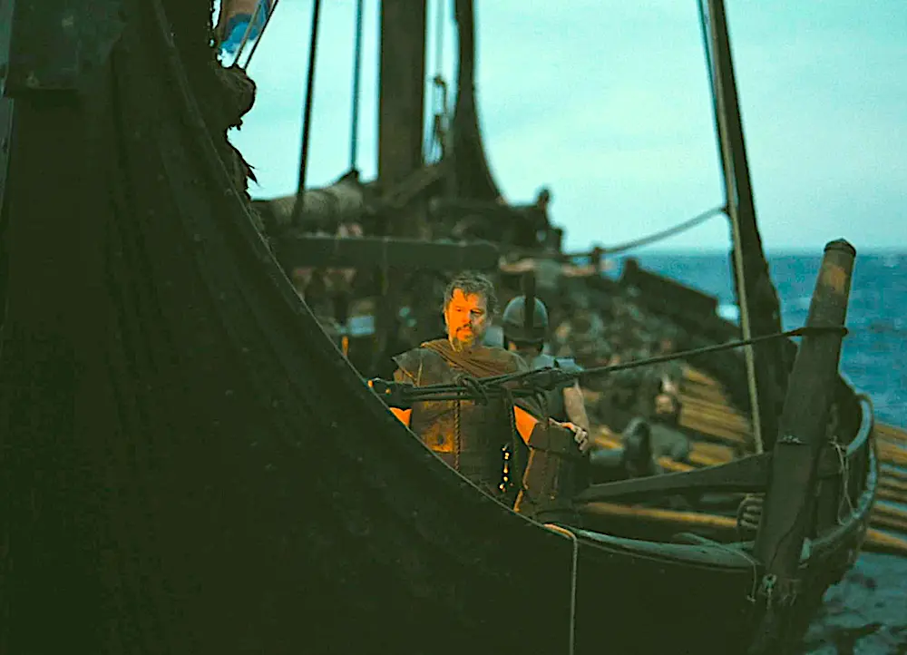 Odysseus (Matt Damon, center) and his men rowing and sailing back to the Isle of Ithaca, in "The Odyssey." (Universal Pictures)