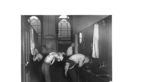 Young boys washing up at the Newsboys’ Lodging House in New York City, circa 1890, the first shelter for runaways in America. Photograph by Jacob Riis. (Library of Congress/Public Domain)
