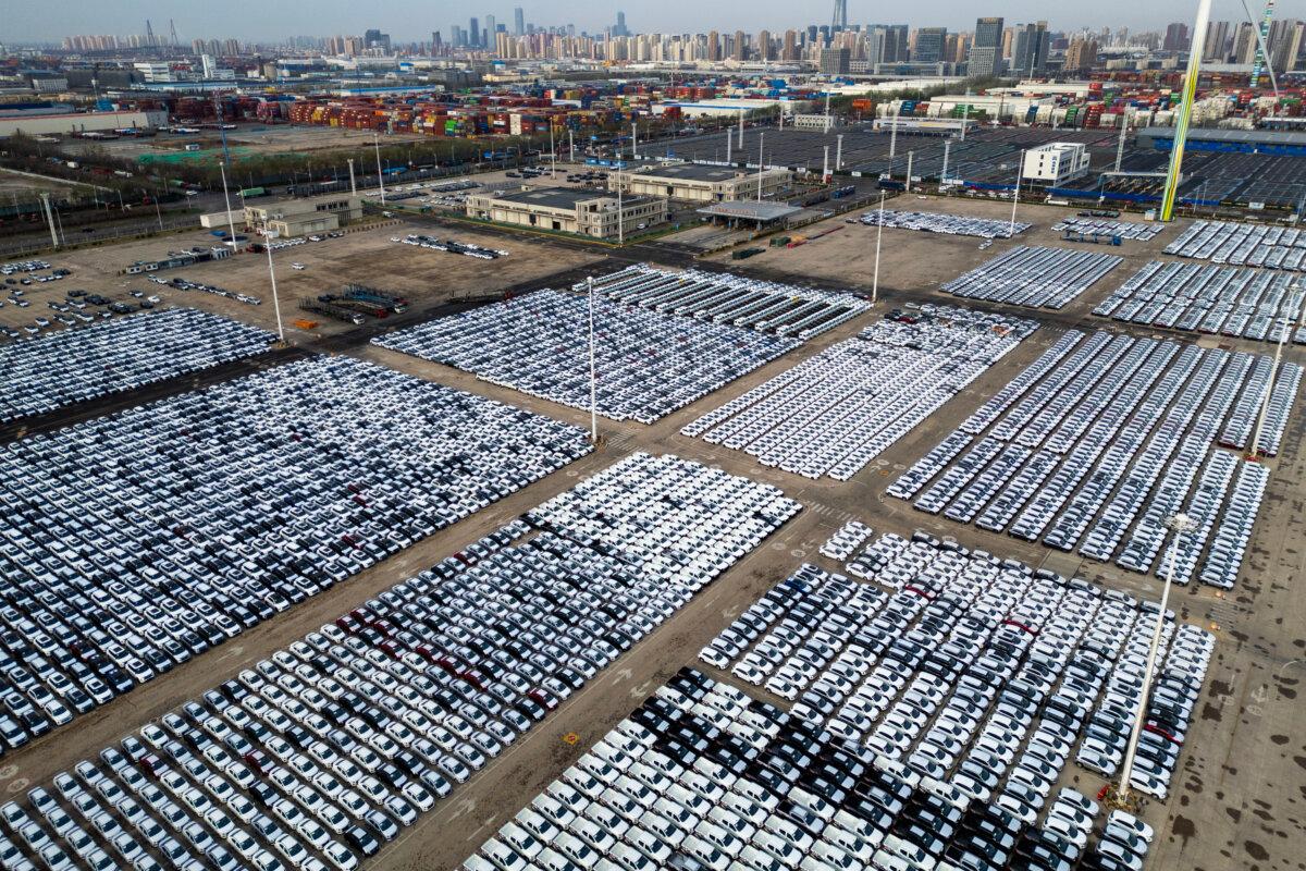 Aerial view of domestic vehicles waiting to be loaded onto a ro-ro ship for export at Binhai New Area in Tianjin, China, on March 30, 2026. (Lintao Zhang/Getty Images)