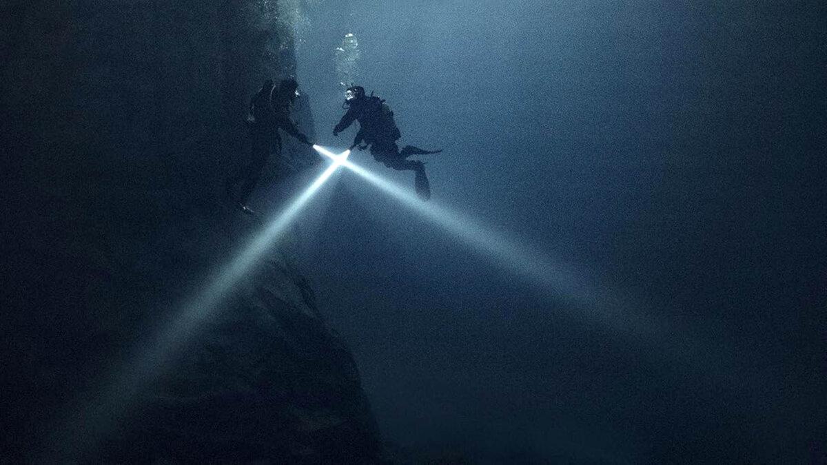 Ida (Moa Gammel) swimming with younger half-sister, Tuva (Madeleine Martin), in “Breaking Surface.” (GJW+)