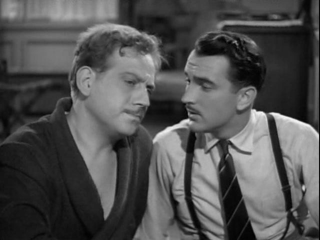 Jeff/Tony (Melvyn Douglas) and Philip Booth (Lee Bowman) have a discussion, in “Third Finger, Left Hand.” (Metro-Goldwyn-Mayer)
