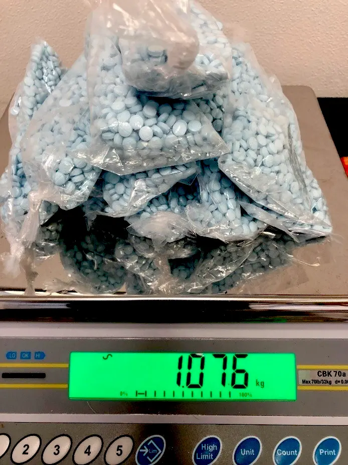 Plastic bags filled with suspected fentanyl pills were seized during a year-long investigation into an alleged drug trafficking operation from Arizona to Madison, Wis. (Courtesy of U.S. Attorney's Office, Western District of Wisconsin)