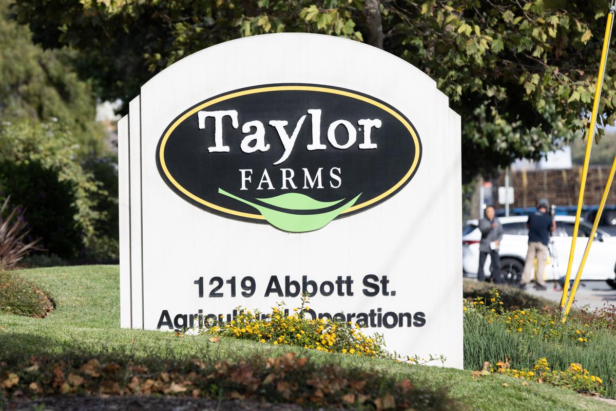 A Taylor Farms sign is displayed at one of its facilities in Salinas, Calif., on July 17, 2026. Taylor Farms, a global fresh produce supplier, is allegedly connected to the recent cyclosporiasis outbreak. (Benjamin Fanjoy/Getty Images)