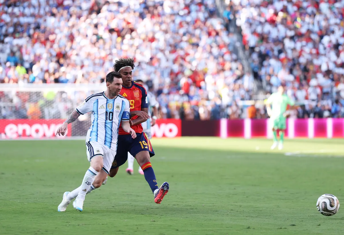 Lionel Messi (L) of Argentina controls the ball against Lamine Yamal (R) of Spain during the FIFA World Cup 2026 Final in East Rutherford, N.J., on July 19, 2026. (Carl Recine/Getty Images)