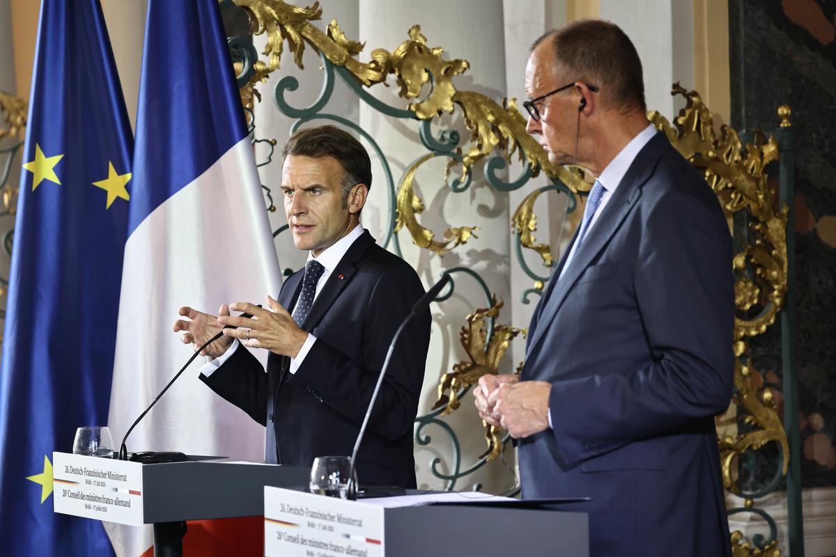 French President Emmanuel Macron (L) and German Chancellor Friedrich Merz hold a press conference following a meeting of the Franco-German Ministerial Council in Brühl, Germany, on July 17, 2026. (Oliver Berg/dpa via AP)