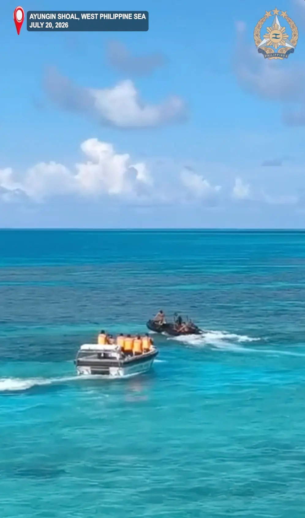 In this photo, taken from video by the Armed Forces of the Philippines, China Coast Guard personnel (L) on rigid hull inflatable boat chases Philippine Navy personnel aboard a rubber boat at the Second Thomas Shoal, locally known as Ayungin Shoal, at the disputed South China Sea on July 20, 2026. (Armed Forces of the Philippines via AP)