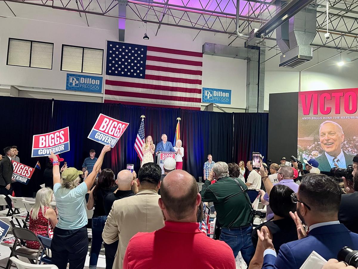 Rep. Andy Biggs (R-Ariz.) spoke to a crowd of enthusiastic supporters who chanted his name as he took the stage at his victory party on July 21, 2026. (Jacki Thrapp/The Epoch Times)