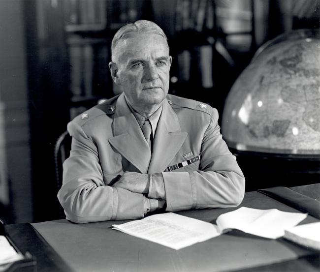 William J. Donovan, head of the OSS, at his desk, circa 1945. (Public Domain)