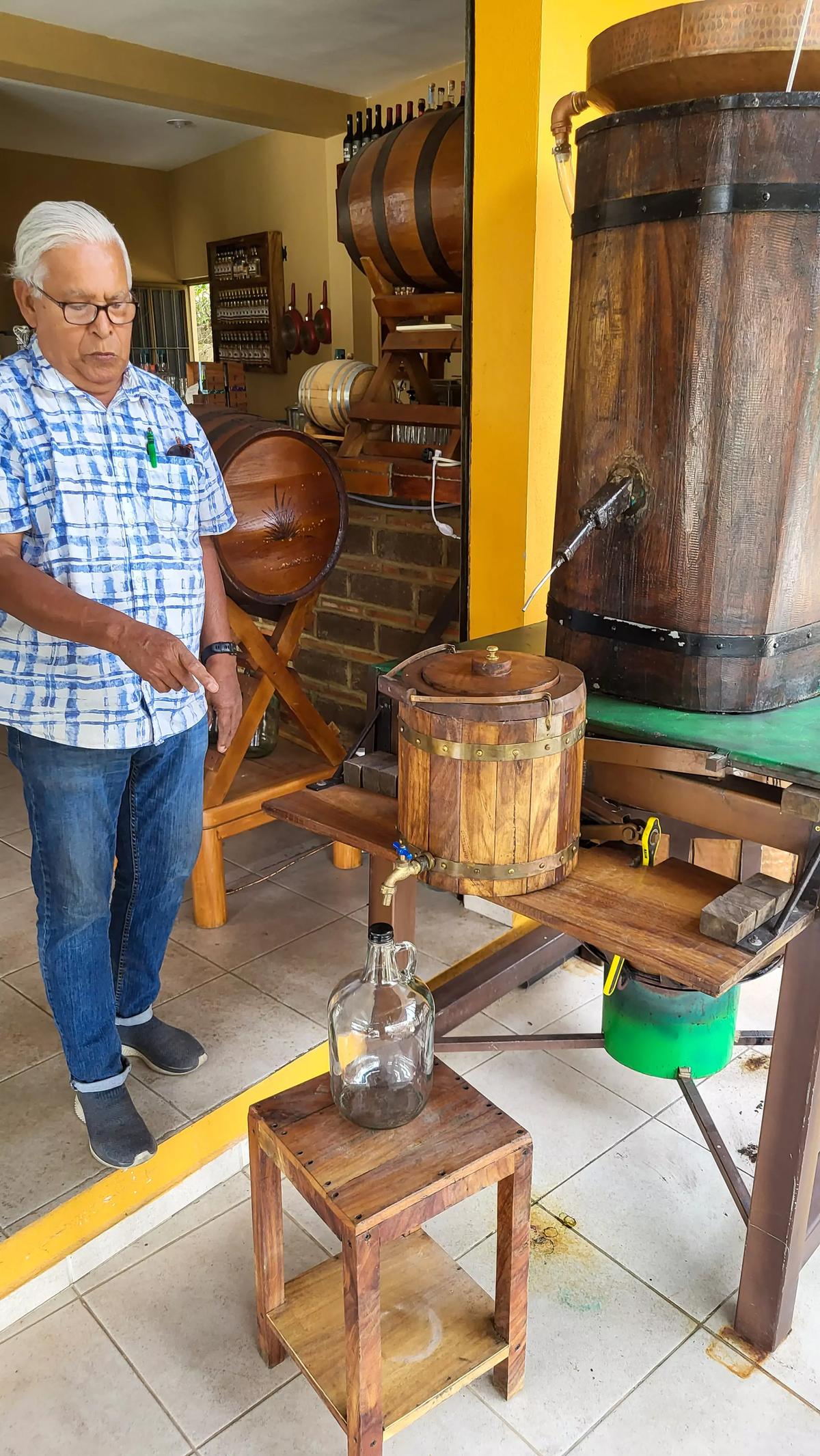 Jorge Velazco Rocha runs an artisanal project of distilling tuba to make palm liquor at his roadside tavern near the town of Comala. (Daniel Hernandez/Los Angeles Times/TNS)