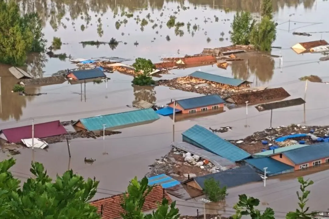 China Flood Survivor Says Officials Ordered Her to Delete Pleas for Help