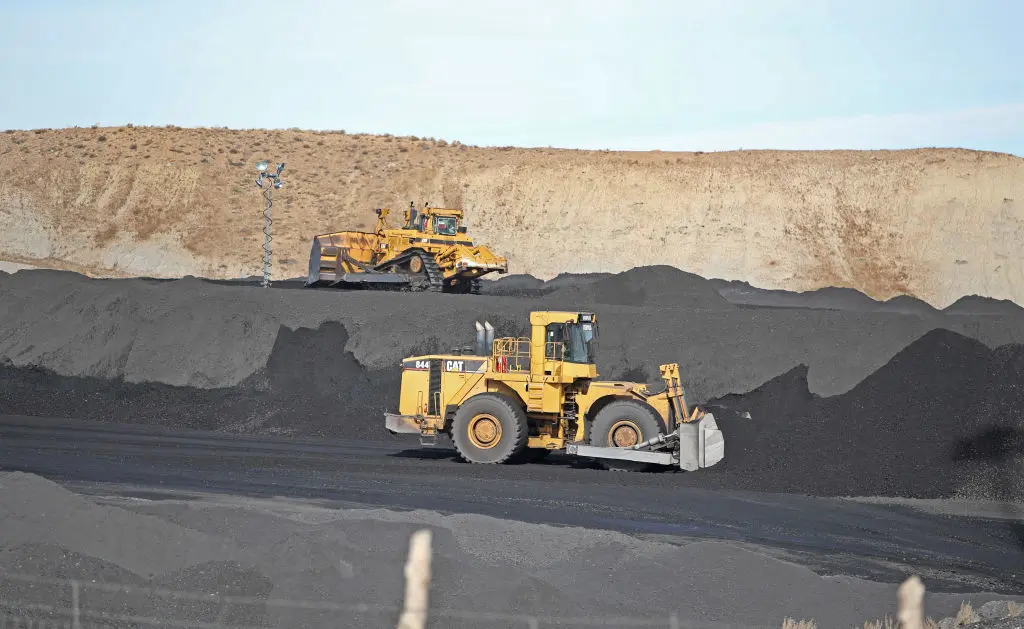 Heavy equipment moves coal into piles at PacifiCorp's Hunter coal-fired power plant outside of Castle Dale, Utah, on Nov. 14, 2019. (George Frey/AFP via Getty Images)