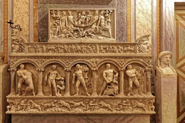 The Twelve Labors of Herakles carved on a Roman sarcophagus. While the dozen labors represented a complete cycle of mastery, Herakles’s final transformation required a passage beyond the 12—the ultimate ordeal of death and apotheosis. (Burkhard Mücke/<a href="https://commons.wikimedia.org/wiki/File:Sarcophagus_with_Heracles%27s_Twelve_Labours_02.jpg">CC BY-SA 4.0</a>)