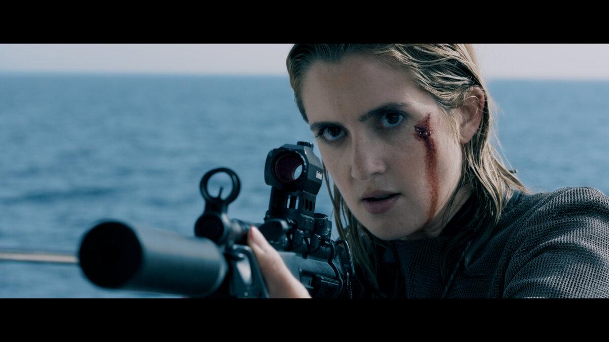 Tatiana (Laura Marano) defends herself, in "Above and Below." (Aura Entertainment)