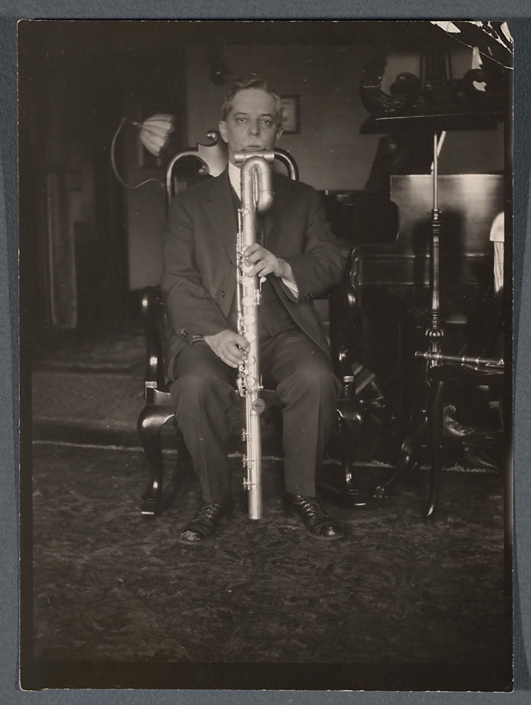 Dayton C. Miller plays a Milan-made Albisiphon (bass flute), 1922. Library of Congress. (Public Domain)
