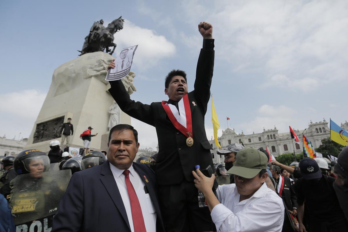 Jesus Perez, of the opposition Together for Peru party, joins opponents of new President Keiko Fujimori during a protest on the day of her inauguration in Lima, Peru, on July 28, 2026. (Gerardo Marin/AP Photo)