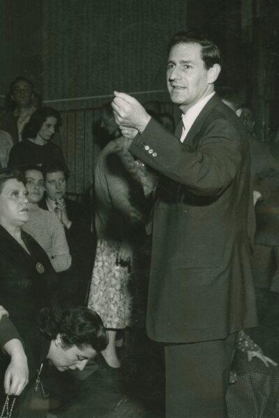 Menotti directing his opera "The Saint of Bleecker Street," 1955. (Public Domain)