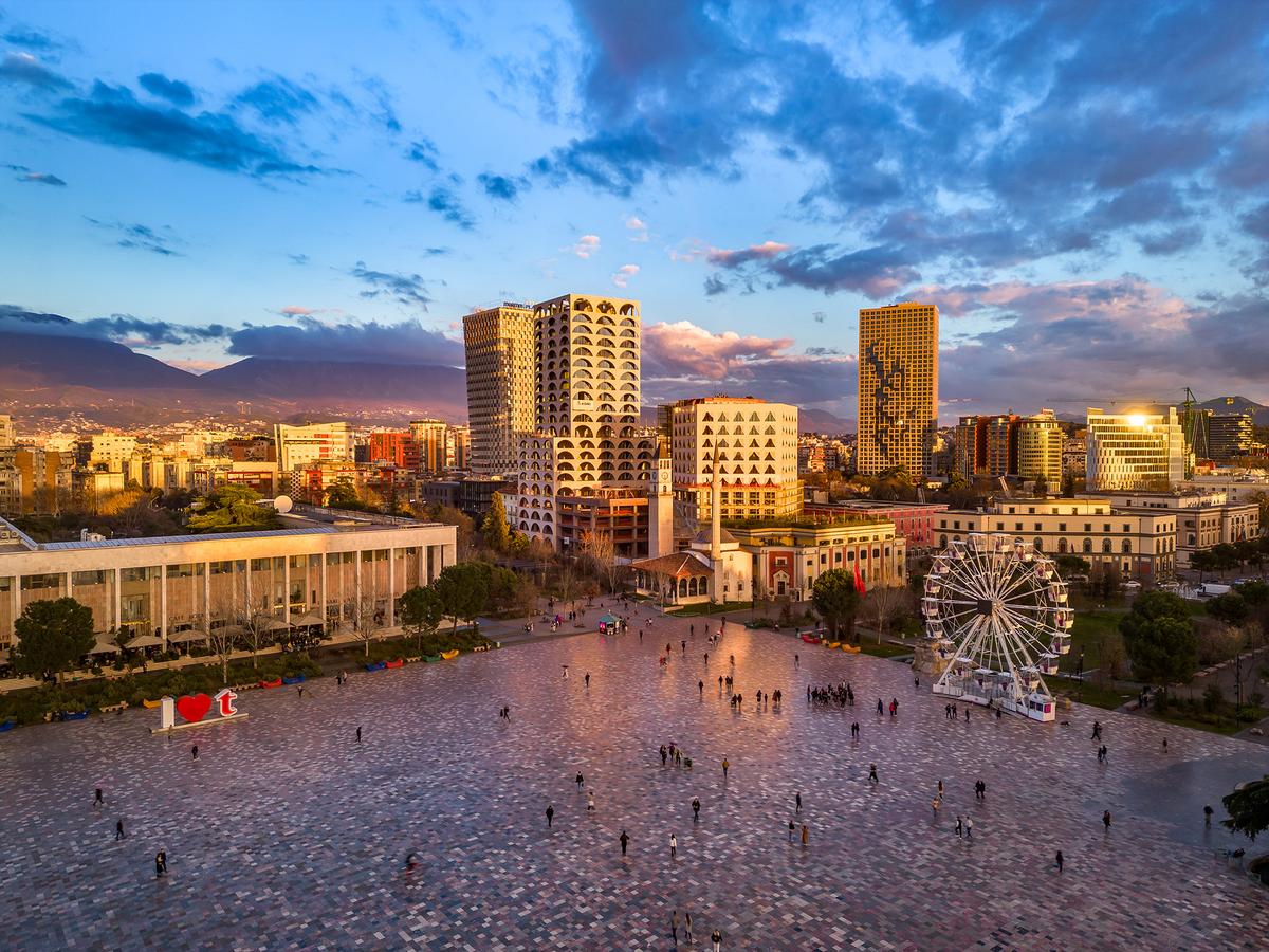 Skanderbeg Square, named after an Albanian national hero, was extensively renovated to be a pedestrian-friendly public space in the new future-facing Tirana. It serves as a gathering place for festivals, concerts, and civic events. (Fani Kurti/Getty Images)