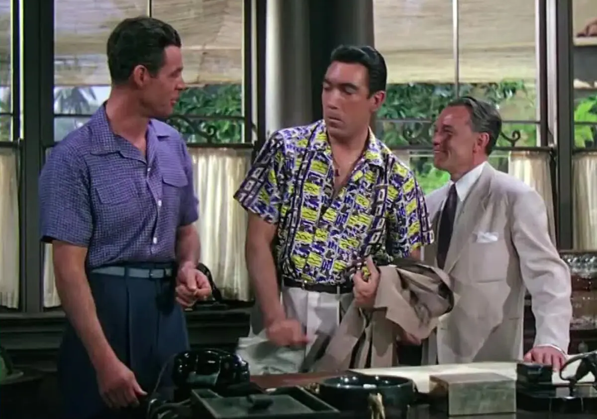 (L–R) Brad Carlton (Robert Ryan) and Tony Bartlett (Anthony Quinn), talk with Dwight Trevor (Karel Stepanek), in “City Beneath the Sea.” (GJW+)