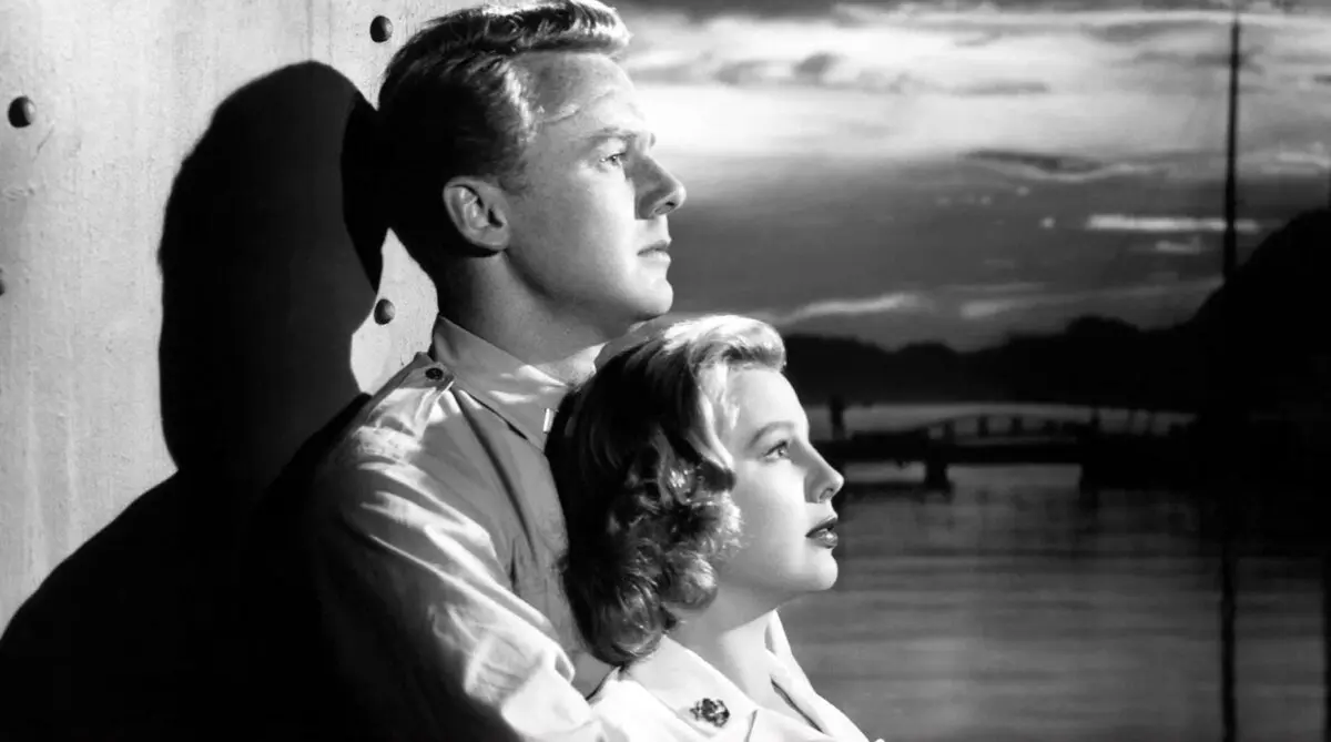 Alec Brooke (Van Johnson) holds Nancy Frazer (June Allyson) tight, in “High Barbaree.” (MGM)
