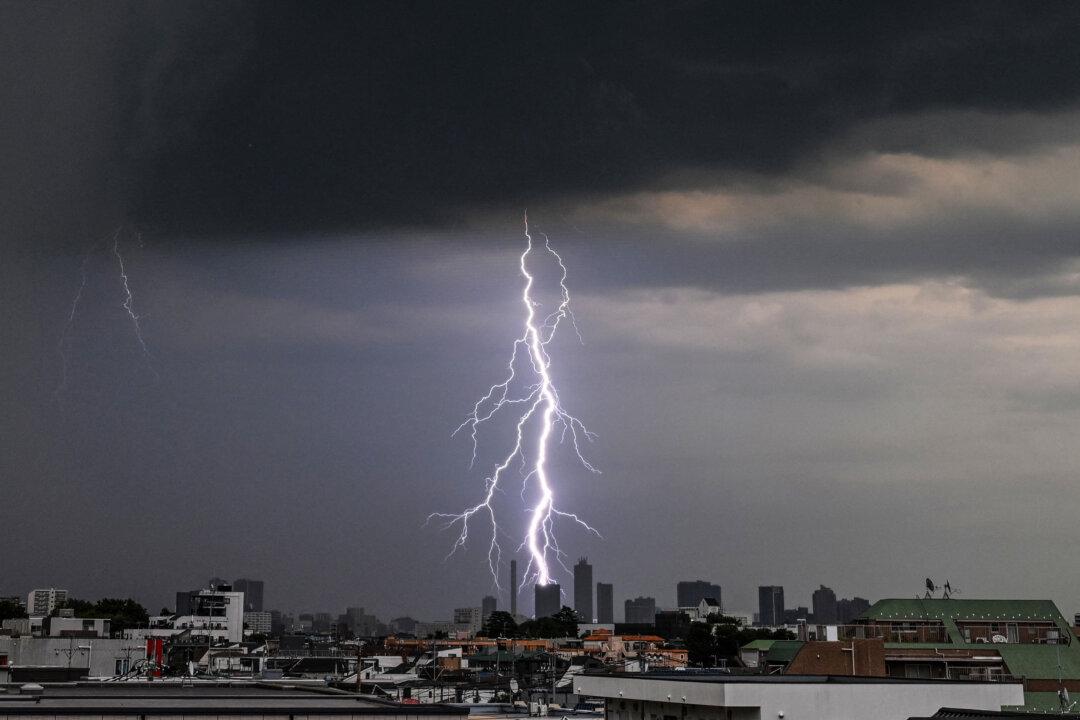 Lightning strikes a building in Ikebukuro in northern Tokyo on July 30, 2026. (Photo by ANDREW CABALLERO-REYNOLDS / AFP via Getty Images)