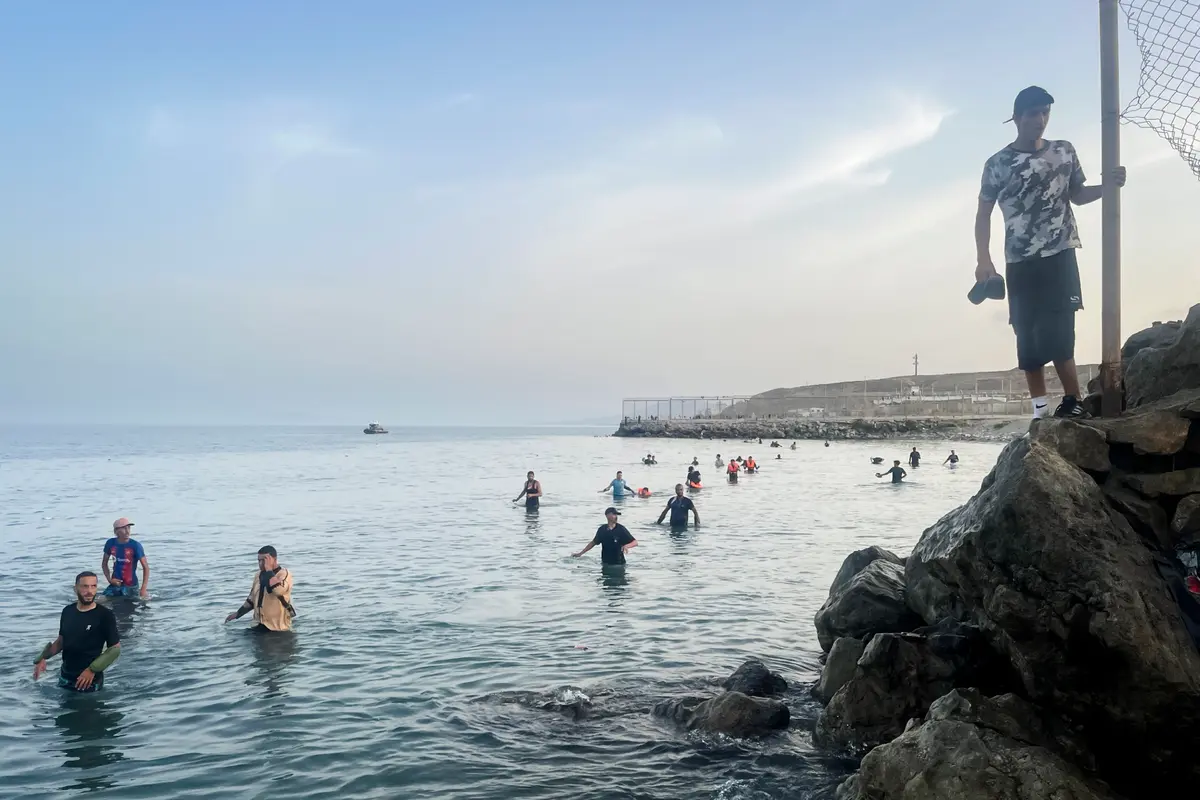 Moroccan migrants continue swimming across the sea border into Ceuta, July 31, 2026, as arrivals persist. (Etienne Fauchaire/The Epoch Times)