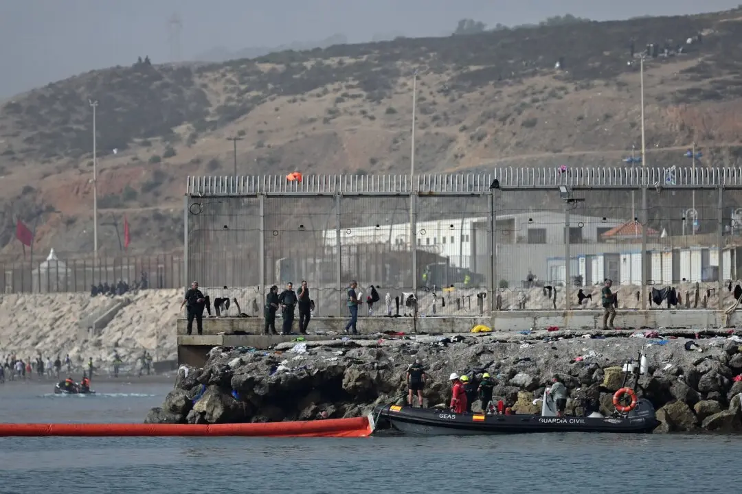Spanish Authorities Install Floating Barrier to Block Illegal Sea Crossings Into Ceuta