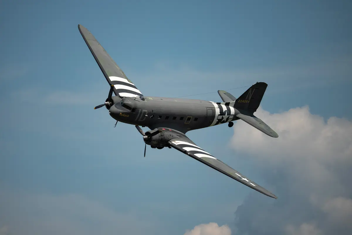 Placid Lassie's paint job includes the invasion stripes common on D-Day planes on Aug. 1, 2026. (Larry Dye/The Epoch Times)