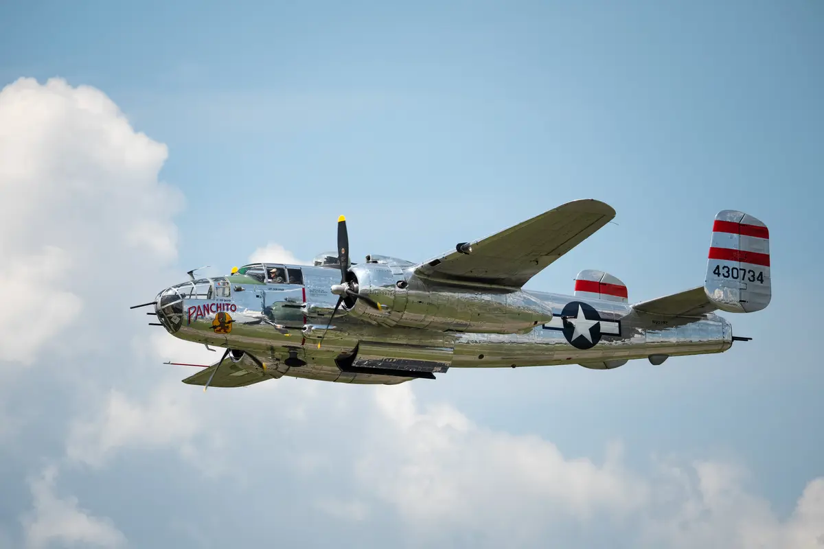 The historic B-25 J Mitchell Panchito performs a mock bombing run on Aug. 1, 2026. (Larry Dye/The Epoch Times)