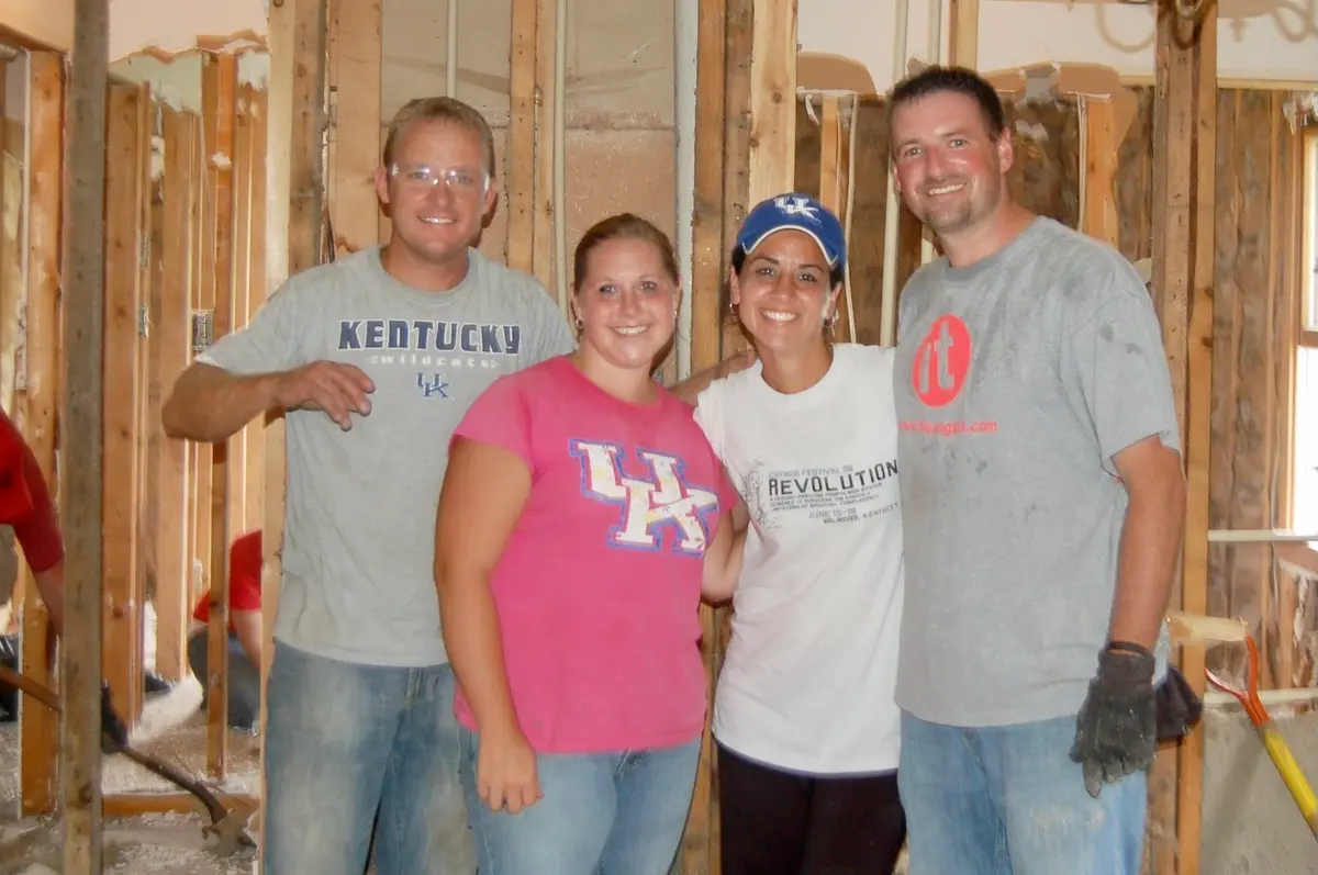 Michelle and Ked Frank (2nd from R and R) with helpers, in the Kentucky farmhouse they rehabbed to become their first shelter for human trafficking victims, in 2010. (Courtesy of Ked and Michelle Frank).