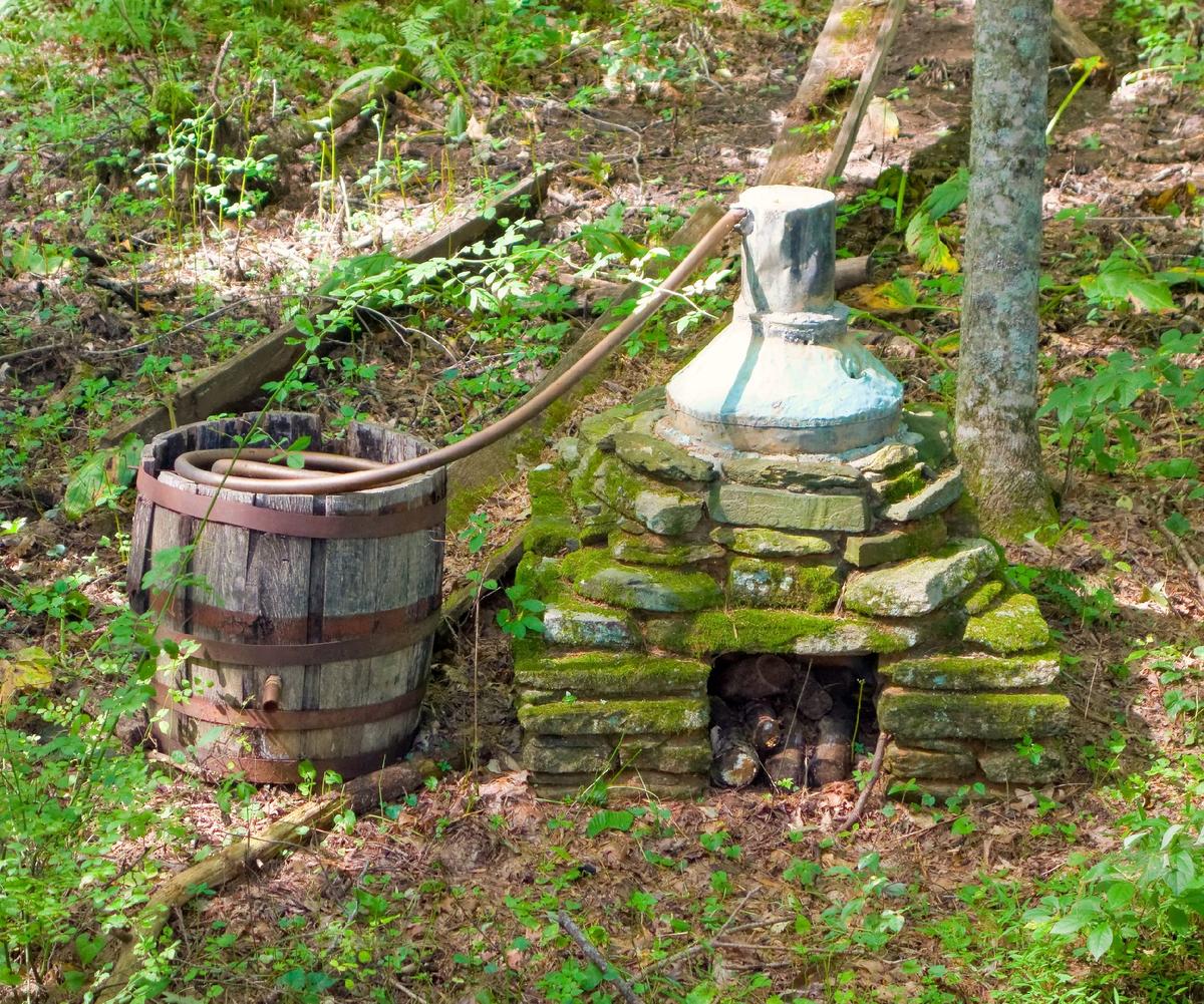 A still in the wood justifies the claim by Franklin County, Virginia, to be the moonshine capital of the world. (Photo courtesy of Boulder32/Dreamstime)