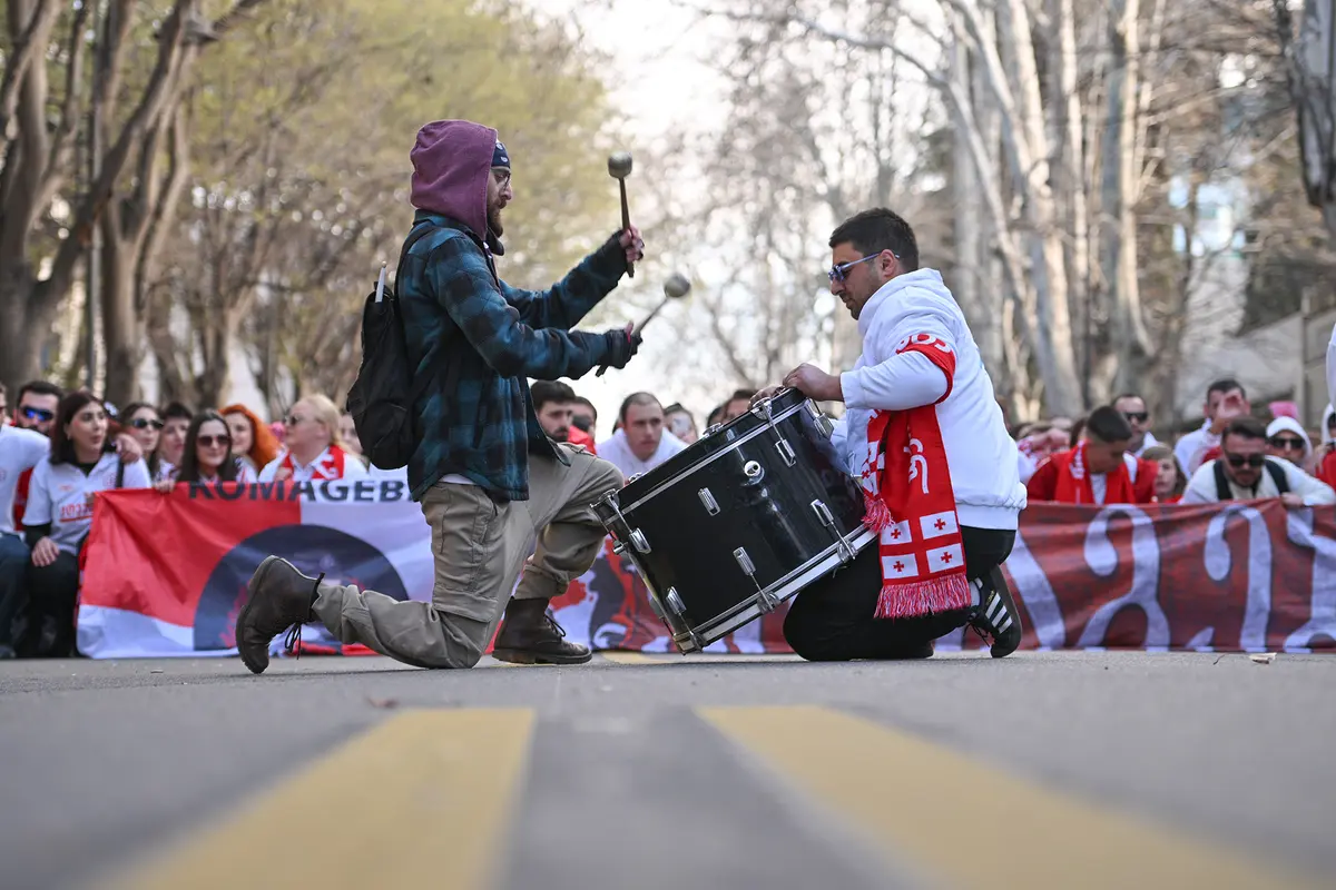 Georgian supporters march to the stadium to watch the UEFA Nations League match between Georgia and Armenia at Dinamo Arena, Tbilisi, on March 23, 2025. (Levan Verdzeuli/Getty Images)