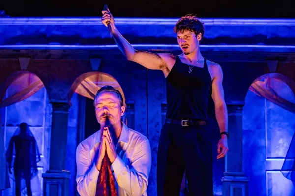 The cast brings Shakespeare’s thrilling story to life, with Drew Bos as Hamlet (standing), under the open sky at Austin Gardens in Oak Park. (Josh Darr)