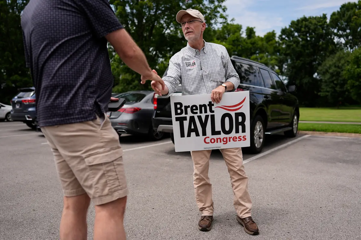 Republican congressional candidate state Sen. Brent Taylor (R-Memphis) speaks to a supporter outside an early voting polling place in Brentwood, Tenn., on July 24, 2026. (George Walker IV, File/AP Photo)