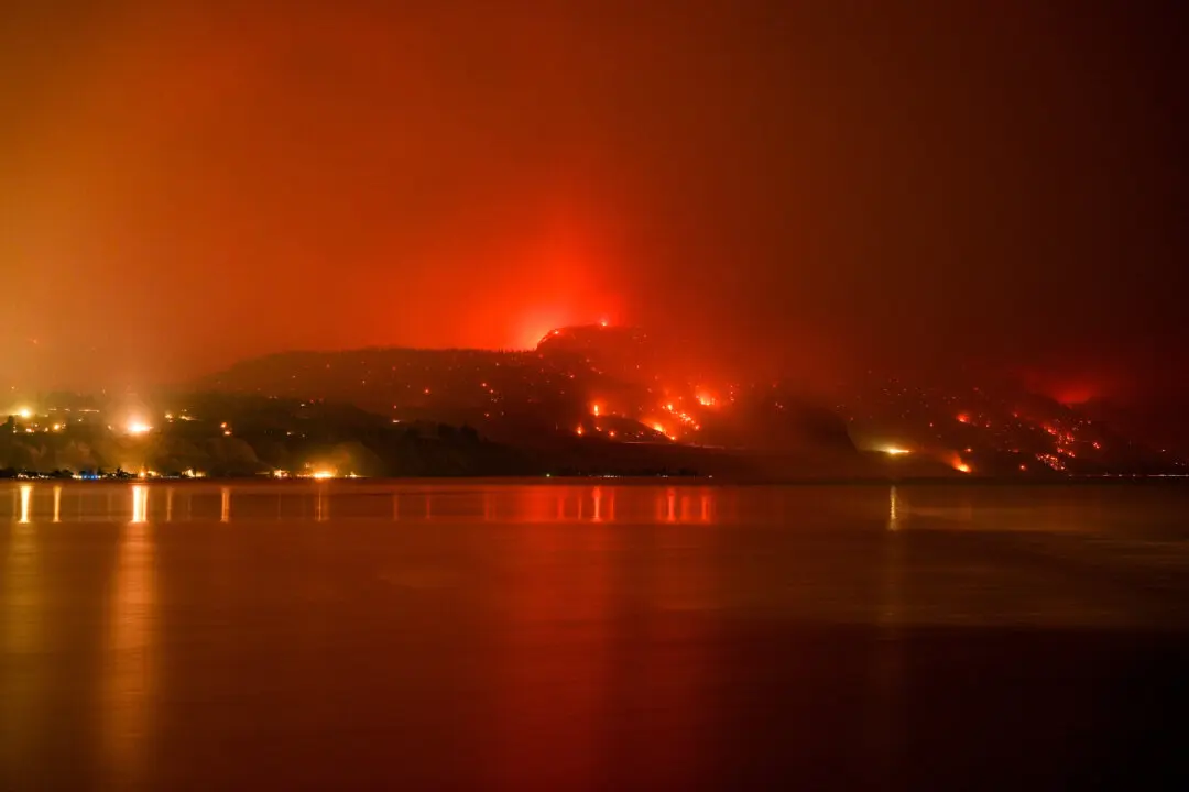 Wildfires Burn Across Western US and Canada as Residents Are Evacuated