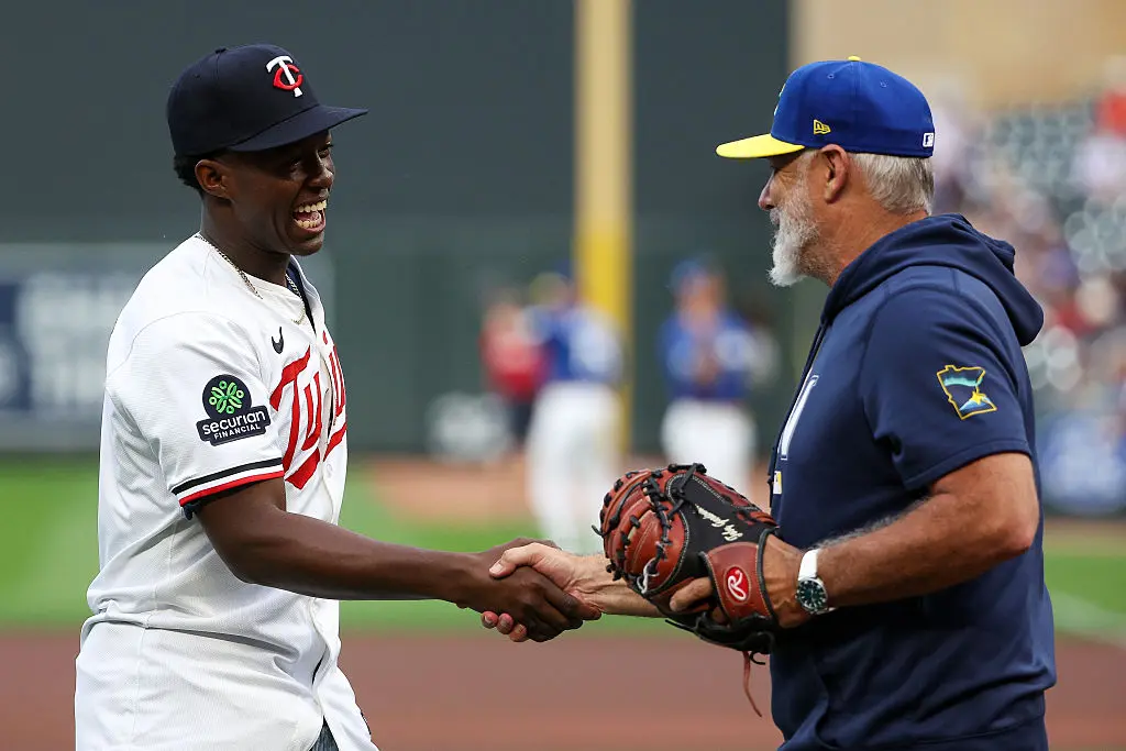 The Minnesota Twins' first-round draft pick Vahn Lackey (L) and manager Derek Shelton shake hands before the game between the Twins and the Athletics at Target Field in Minneapolis, Minn., on July 24, 2026. (Matt Krohn/Getty Images)