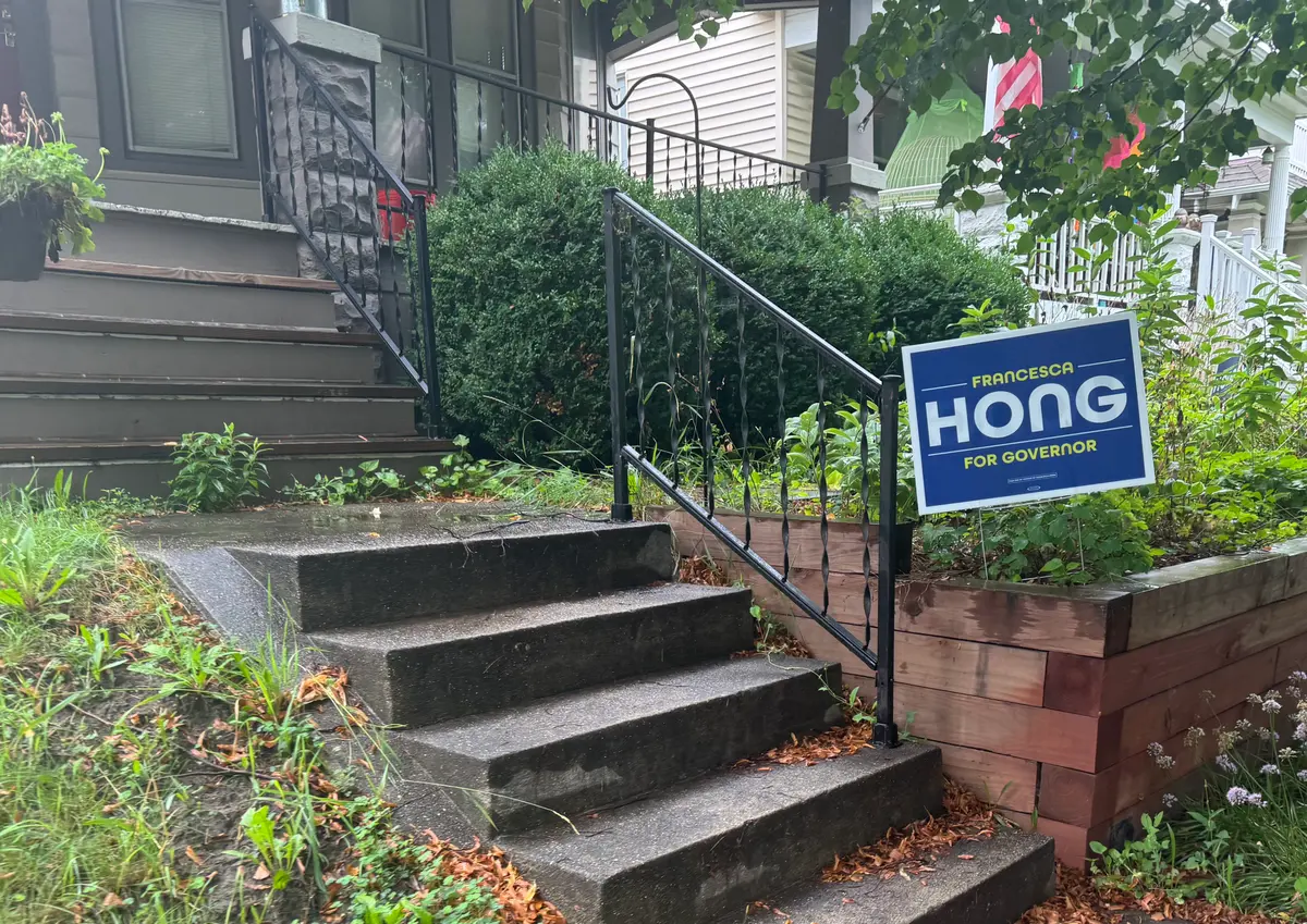 One of many yard signs displaying support for gubernatorial candidate Francesca Hong in the Milwaukee suburbs on August 11, 2026. (Joseph Lord/The Epoch Times)