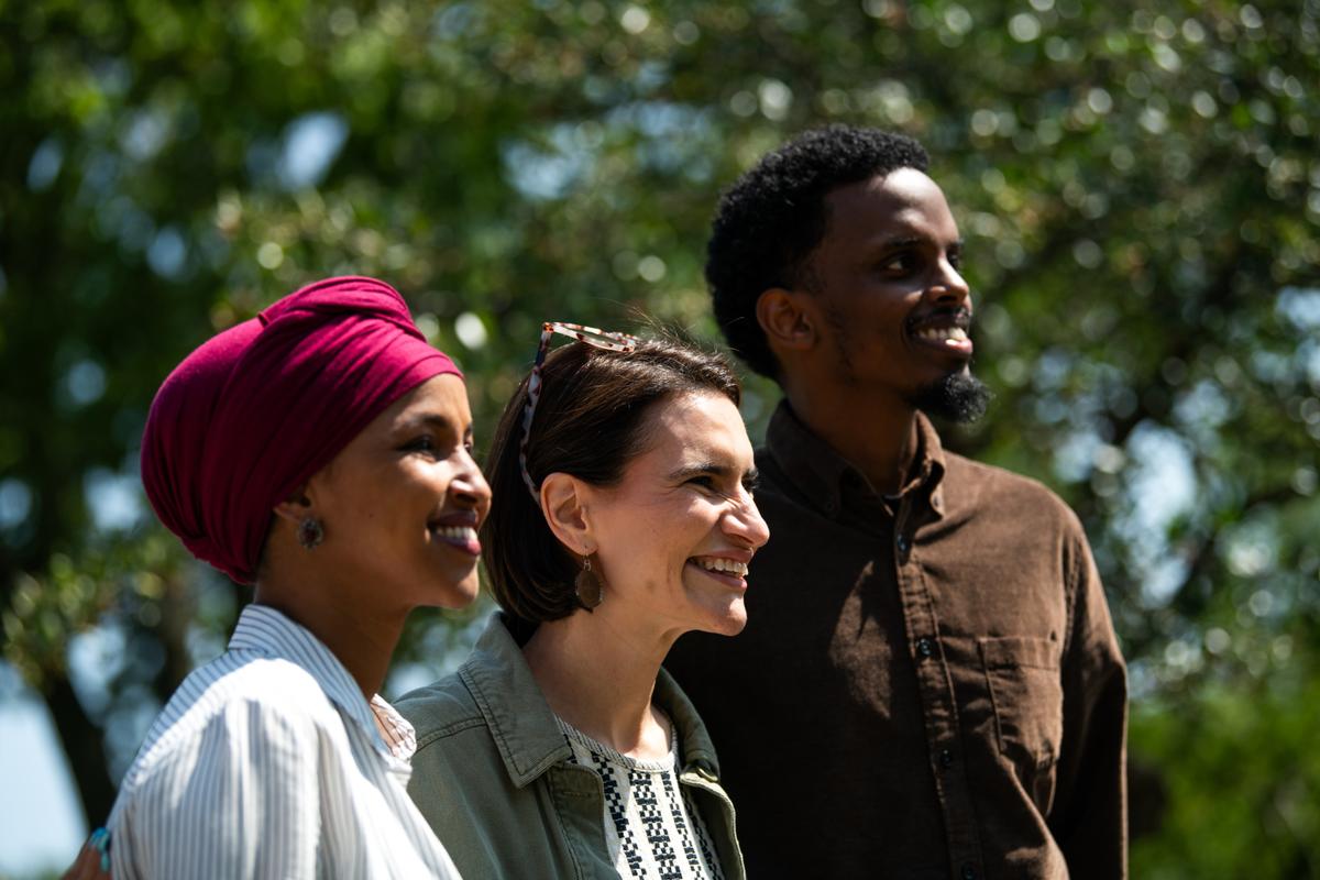 Democratic Senate candidate, Minnesota Lt. Gov. Peggy Flanagan (C), poses for a photo with U.S. Rep. Ilhan Omar (D-Minn.) and Minnesota state Sen. Omar Fateh (R) during a get out the vote event at Cedar Field Park in Minneapolis, Minn., on Aug. 8, 2026. (Stephen Maturen/Getty Images)