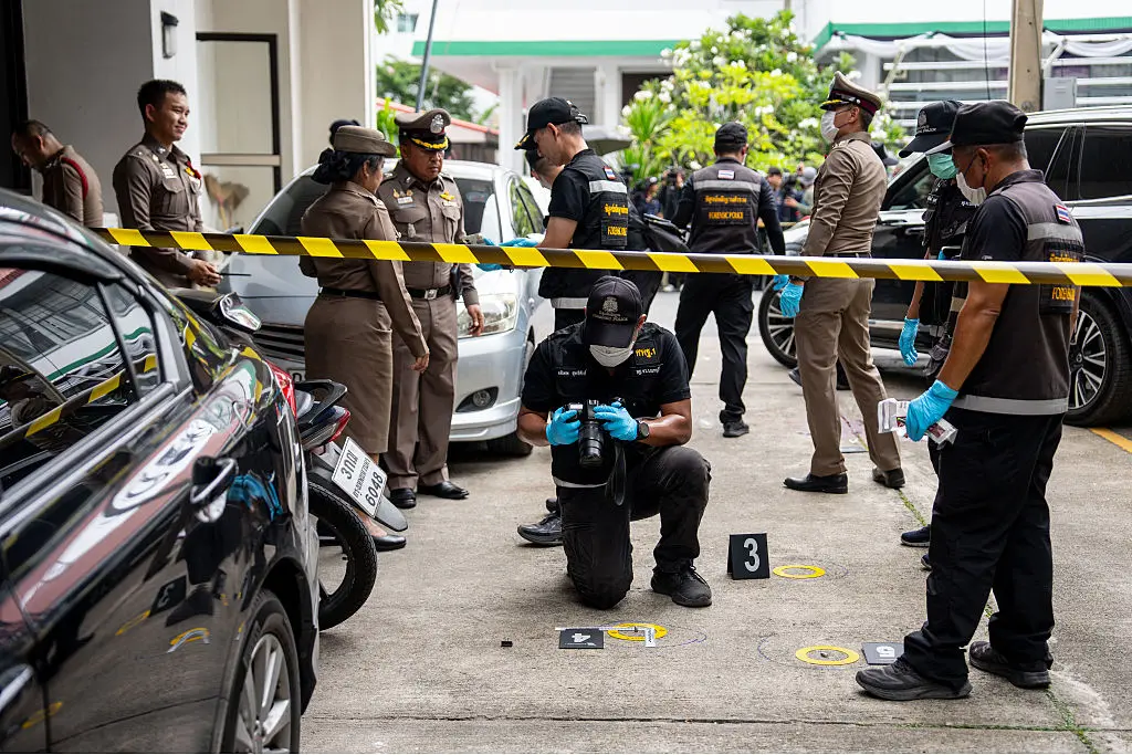 Forensic police officers gather evidence at the Nonthaburi Provincial Administrative Organization (PAO) office in Nonthaburi province, north of Bangkok, on August 10, 2026. (Arnun Chonmahatrakool/Thai News Pix/AFP via Getty Images)