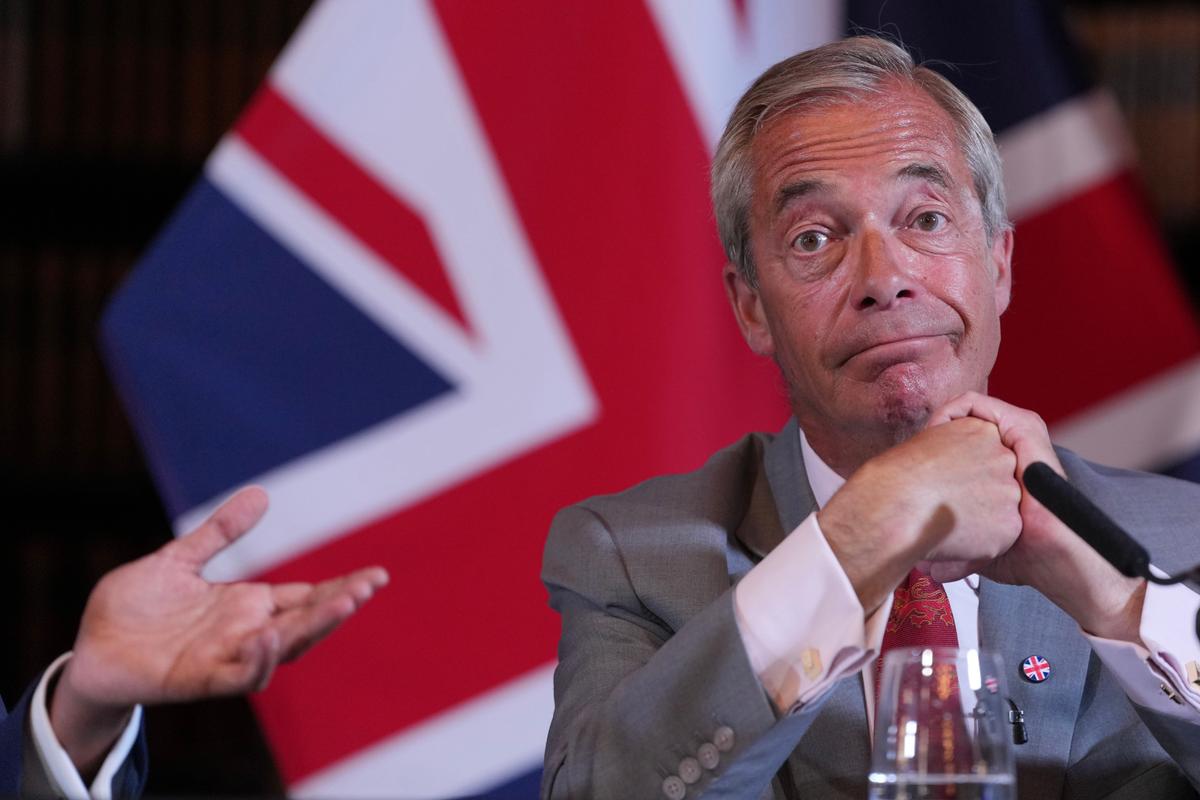 Nigel Farage, Leader of Britain's Reform UK party, attends a press conference in London on Aug. 10, 2026. (AP/Kin Cheung)