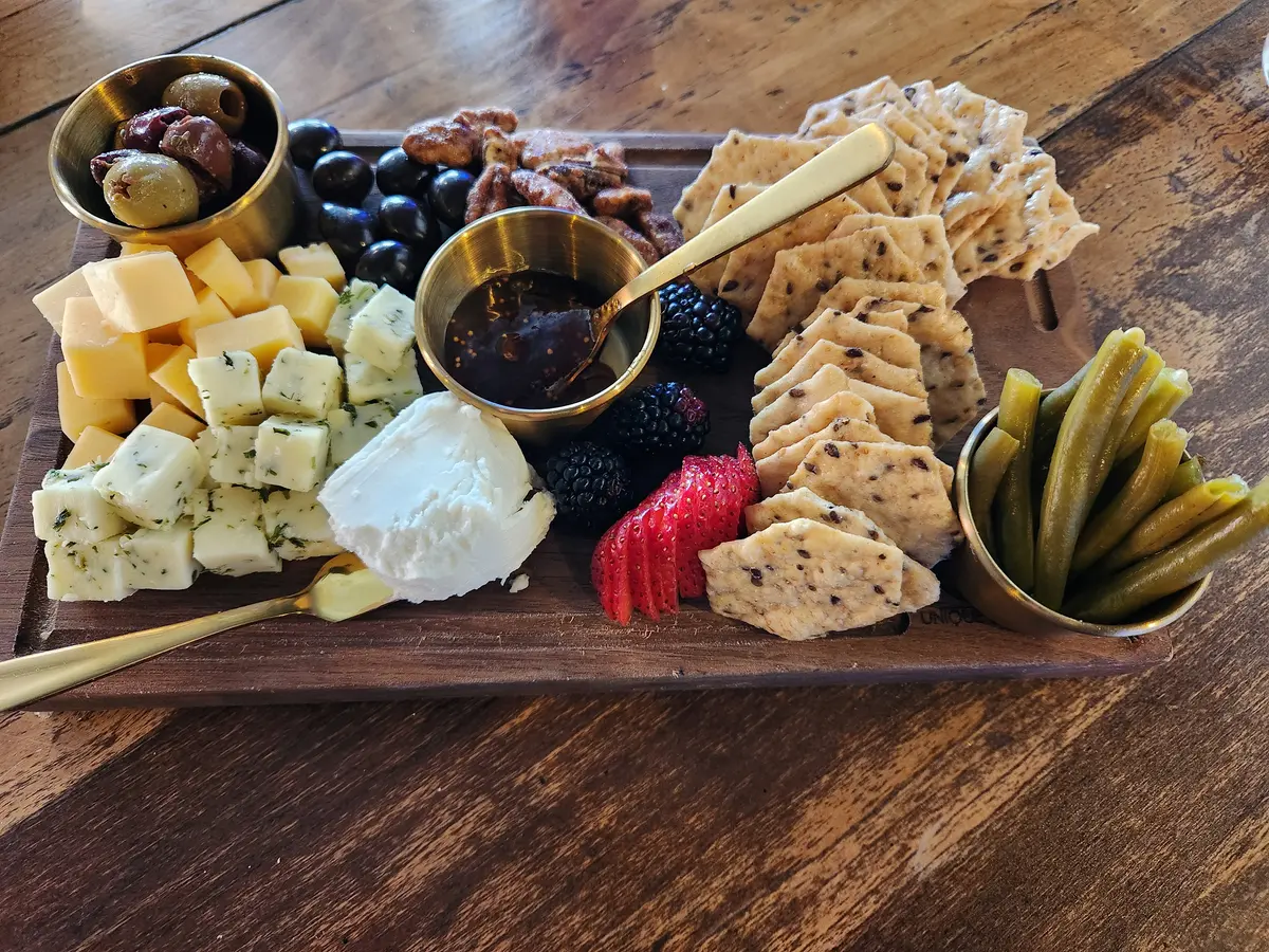A sized-to-share snack tray at Petals Wine Bar in Wytheville, Virginia, is plated to please. (Myscha Theriault/TNS)
