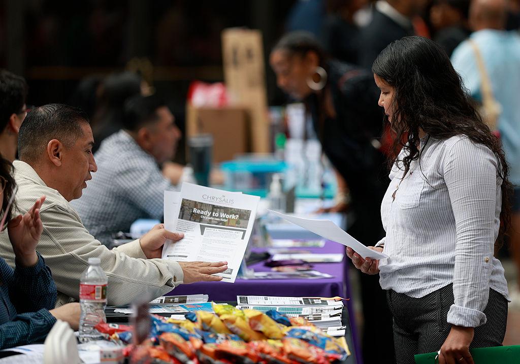 A job seeker meets with a recruiter during the HIRE360 Diversity Hiring Expo & Mega Career Expo at the Carson Event Center, in Carson, Calif., on June 30, 2026. (Justin Sullivan/Getty Images)