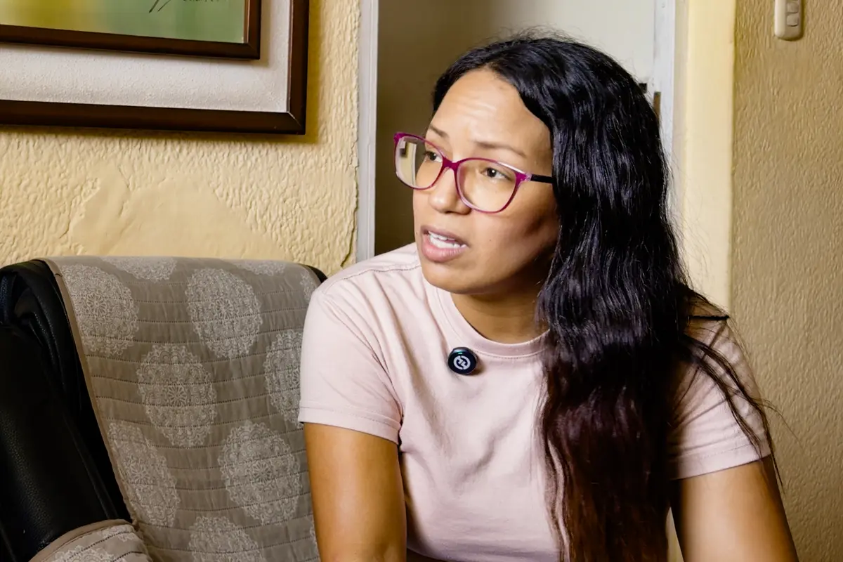 Hiowanka Ávila shares some of the methods the Venezuelan regime has used to torture her brother, who is being held in El Rodeo prison, at her home in the Catia neighborhood of Caracas, Venezuela, on July 8, 2026. (Frederico Vidovix/The Epoch Times)