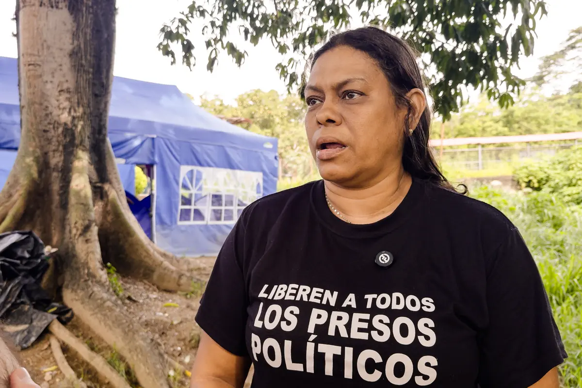 Massiel Cordones protests against her son's imprisonment outside El Rodeo prison, in Guatire, Venezuela, on July 8, 2026. Cordones said her son has been tortured during his six years in prison so far. (Frederico Vidovix/The Epoch Times)