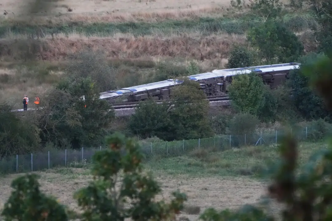 Passenger Train Derails and 11 People Injured After Carriages Overturn in Southern England