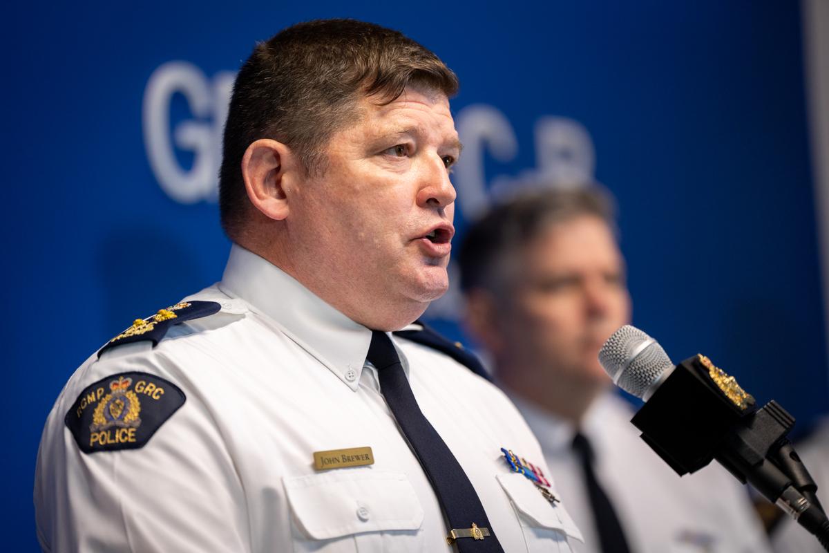 RCMP Assistant Commissioner John Brewer speaks during a news conference in Surrey B.C., on Nov. 21, 2024. (The Canadian Press/Ethan Cairns)