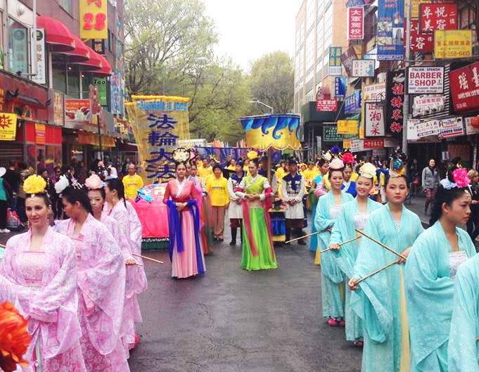 Falun Gong performers depicting heavenly maidens prepare to move out for the Flushing parade. (Leo Timm/Epoch Times)