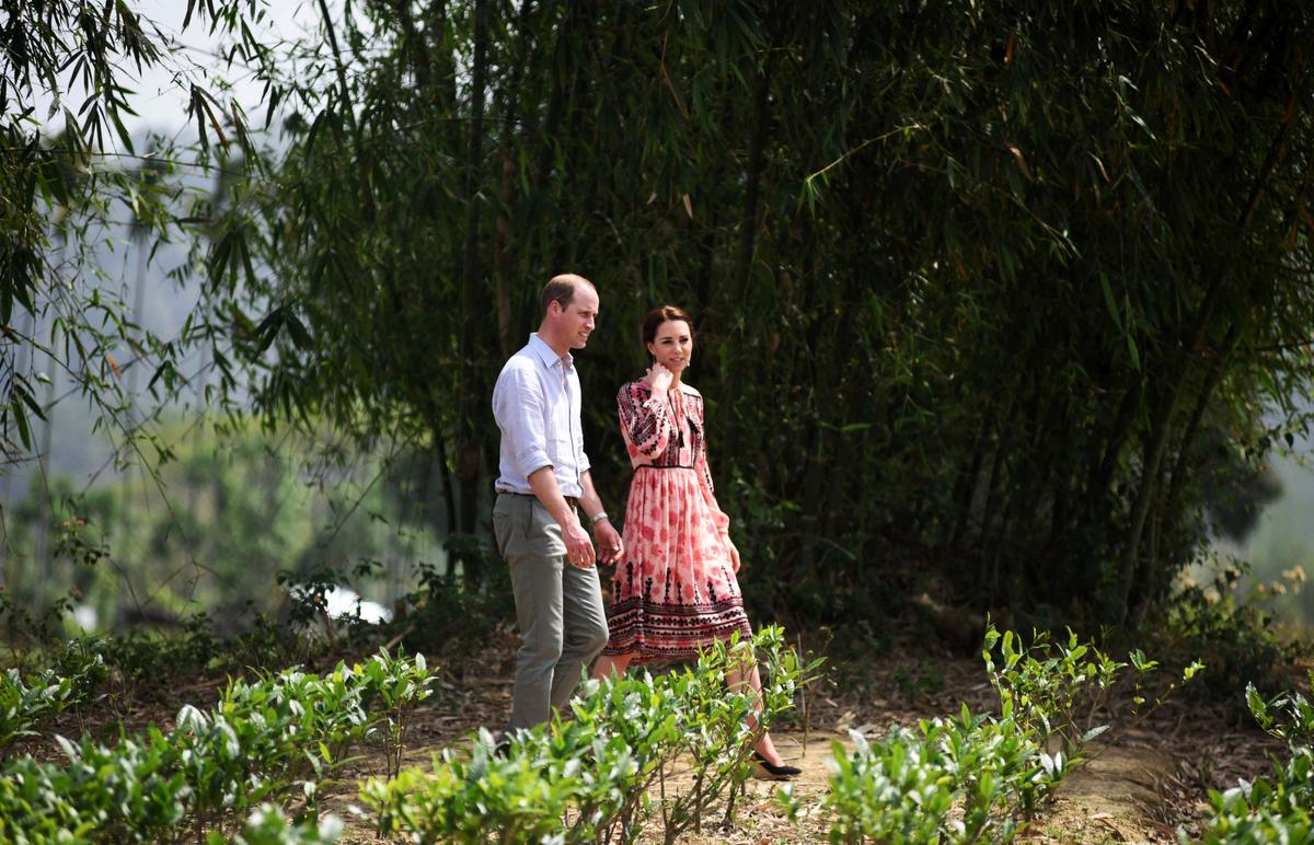 Britain's Prince William, Duke of Cambridge and Catherine, Duchess of Cambridge visit a village tea garden in Kaziranga, India's Assam State, on April 13. (BIJU BORO/AFP/Getty Images)